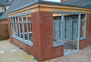 Spray painted windows and doors on a conservatory